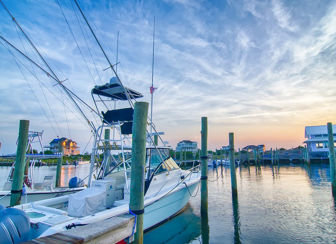Insurance Solutions - Sport Fishing Boats at a Marina During Sunset